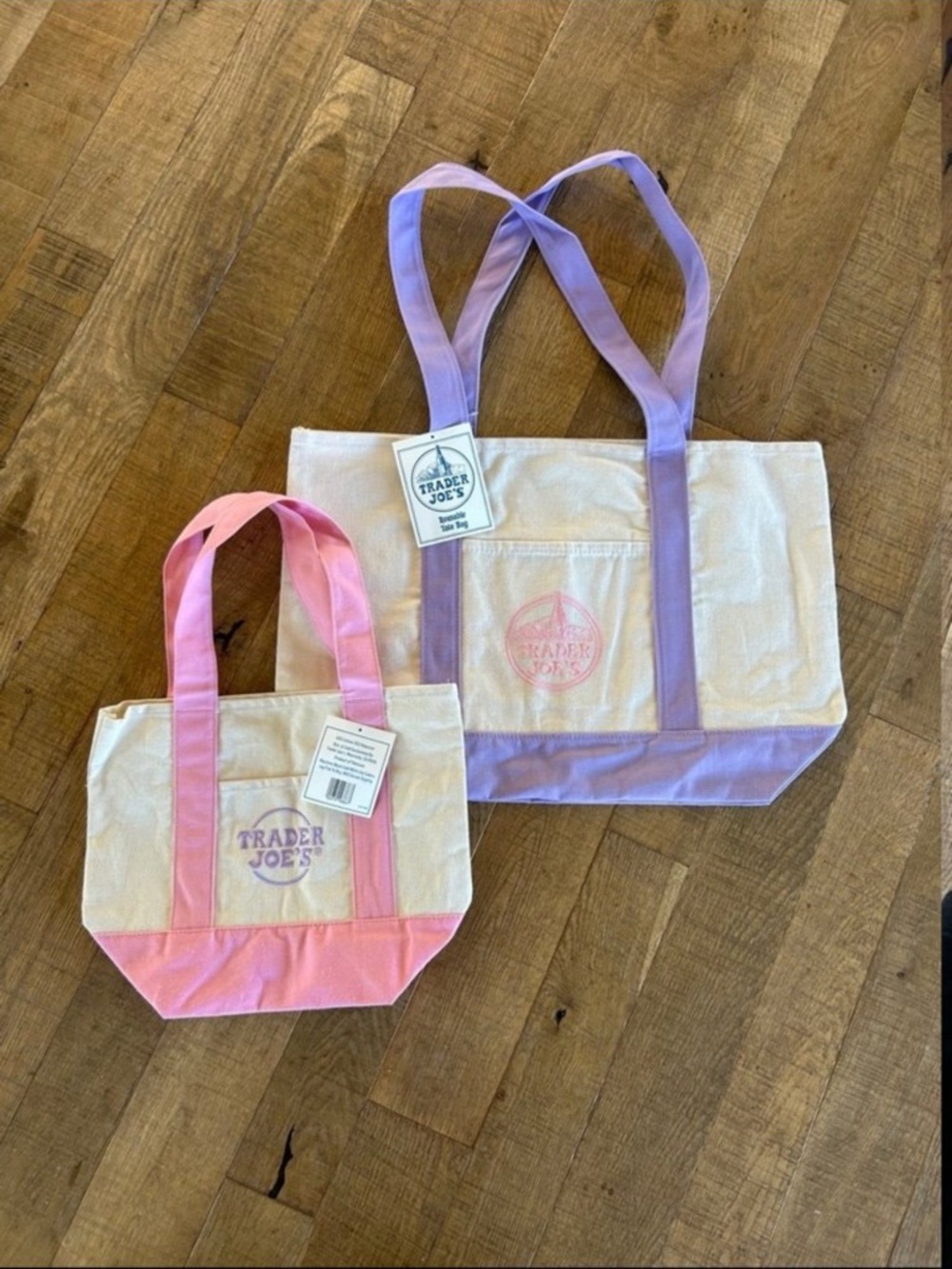 Trader Joe’s large lavender and mini pink tote bags